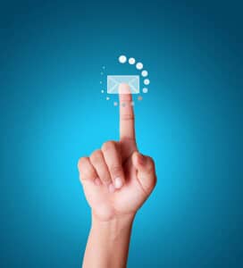 hand touching screen with email loading